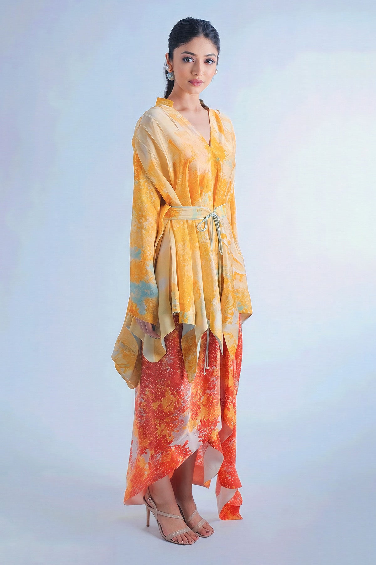 Kaftan Style Top Paired With Dape Skirt And Belt