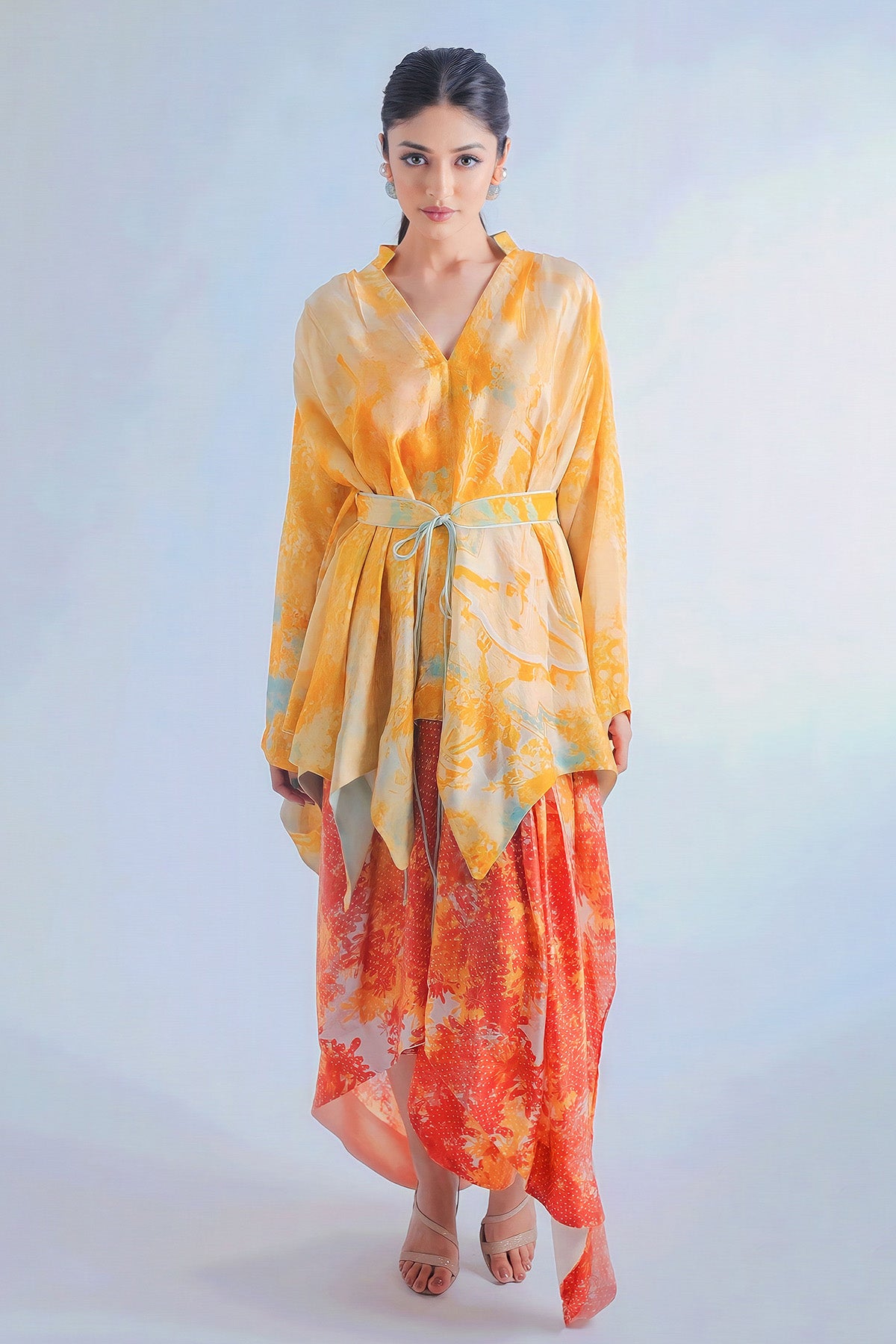 Kaftan Style Top Paired With Dape Skirt And Belt