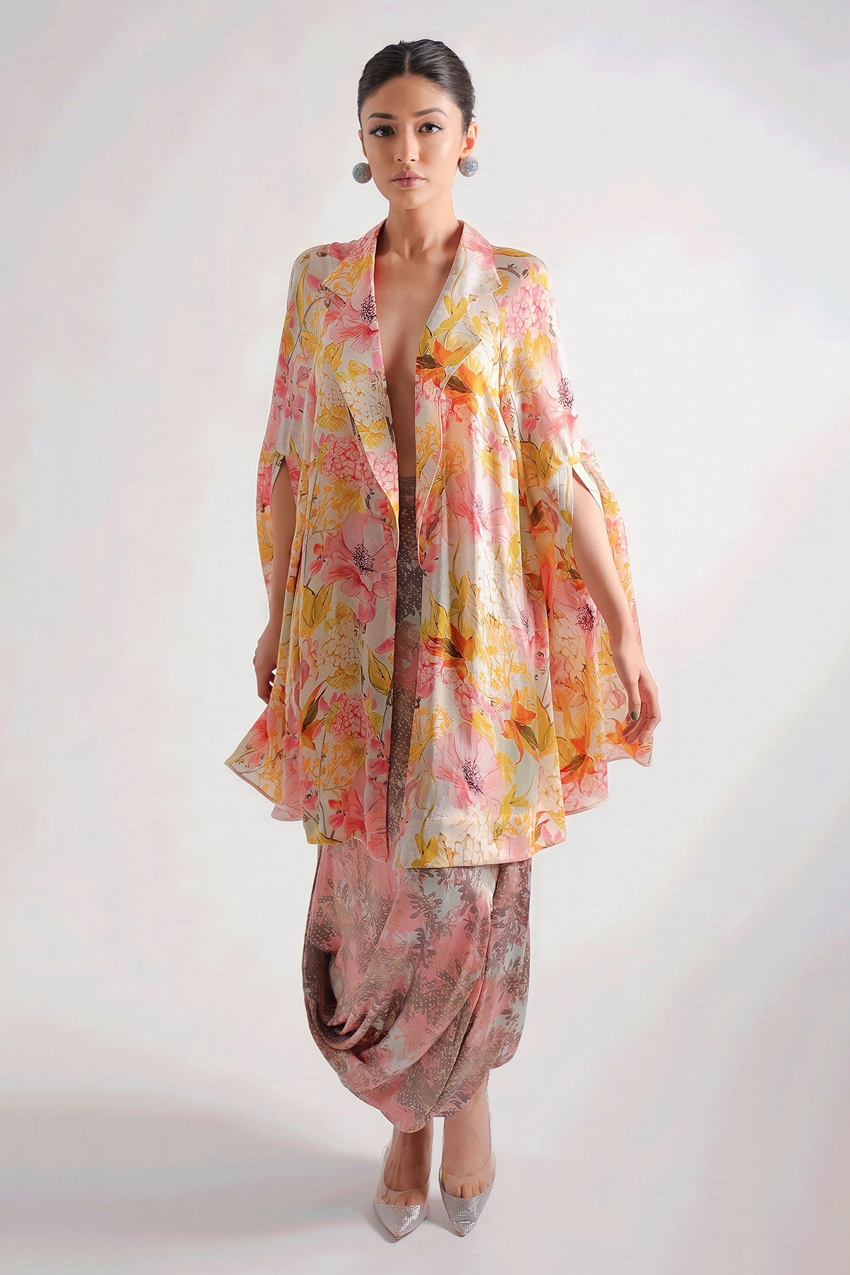 Cowl Slirt Paired With Bustier And Cape
