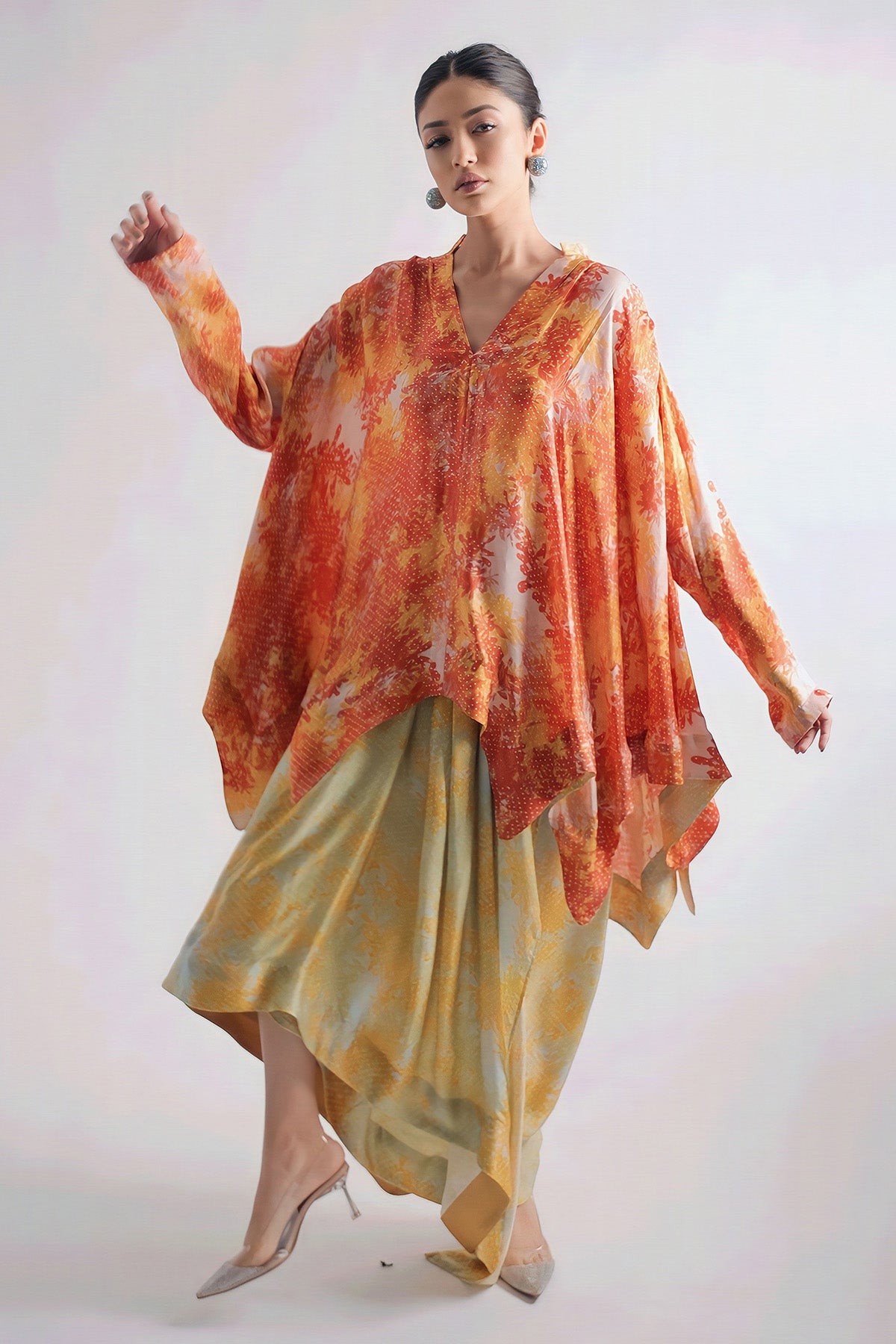 Kaftan Style Top Paired With Dape Skirt